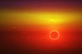 amazing phenomenon of total sun eclipse over cloud sunset orange sky Royalty Free Stock Photo