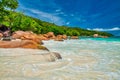 Amazing picturesque paradise beach with granite rocks and white sand, turquoise water on a tropical landscape, Seychelles