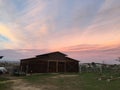 Amazing pink and orange sky Sunrise with barn Royalty Free Stock Photo