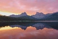 Pink sunset on Svetloye lake. Ptitsa and Zvezdnyy peaks in mountain nature park Ergaki, Krasnoyarsk region, Siberia