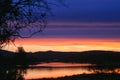 An amazing range of colors at sunset above a lake in Australia Royalty Free Stock Photo