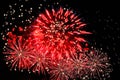 Amazing red fireworks and scattering of white sparks Royalty Free Stock Photo