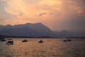 Lake view at red sunset in Manerba del Garda, Italy