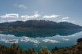 Amazing reflection of mountain peaks in the water of Lake Wakatipu. Glenorchy, New Zealand Royalty Free Stock Photo