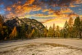 Amazing road through the Dolomites mountains at sunset, Italy