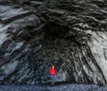 Amazing rocks in iceland and woman torist inside