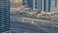 Amazing rooftop view on Sheikh Zayed road surrounded Dubai Marina and JLT skyscrapers timelapse Royalty Free Stock Photo