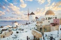 Amazing Santorini panorama. Beautiful Santorini landscape against sunrise sky with clouds