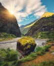 Amazing scene with mountains, beautiful river at sunset