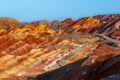 Amazing scenery of Rainbow mountain and blue sky background in sunset. Zhangye Danxia National Geopark, Gansu, China Royalty Free Stock Photo