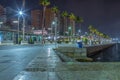 Amazing scenic night view of the marina and the seaport of Malaga in long time exposure photography. Royalty Free Stock Photo