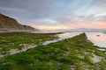 Amazing sea landscape at sunset. Seascape on beach of coast of portugal. outdoor colorful natural landscape with clouds in the sky Royalty Free Stock Photo