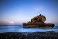 Amazing seascape. Sunrise at Yeh Gangga beach. Rock in the ocean. Waves captured with slow shutter speed. Long exposure with soft Royalty Free Stock Photo