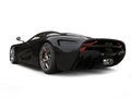 Amazing shiny black supercar - taillight view