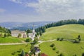 Amazing shot of the Lese church in Slovenia in  a valley with a cloudy sky Royalty Free Stock Photo