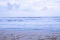 Amazing shot of a sandy beach on a cloudy sky background Royalty Free Stock Photo