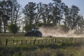 Amazing shot of a tractor working in a farmland Royalty Free Stock Photo