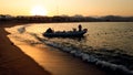 Amazing silhouette photo of inflatable boat with motor rocking on calm ocean waves at the sandy shore against sunset sky Royalty Free Stock Photo