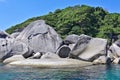 Amazing Similan island. On the shores of the turquoise sea lie huge ancient smooth boulders. Royalty Free Stock Photo