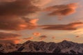 Sky clouds mountains sunset snow Royalty Free Stock Photo