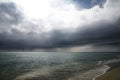 Amazing sky before the rain over sea. Bright glare on the sea before the storm Royalty Free Stock Photo