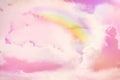Amazing sky with rainbow and fluffy clouds, toned in unicorn colors Royalty Free Stock Photo