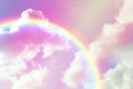 Amazing sky with rainbow and fluffy clouds, toned in unicorn colors Royalty Free Stock Photo
