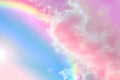 Amazing sky with rainbow and fluffy clouds, toned in unicorn colors Royalty Free Stock Photo