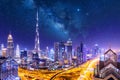 Amazing skyline cityscape with illuminated skyscrapers. Downtown of Dubai at night with stars and milky way, United Arab Emirates Royalty Free Stock Photo