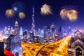 Amazing skyline cityscape with illuminated skyscrapers and fireworks. Downtown of Dubai at night, United Arab Emirates during Royalty Free Stock Photo