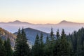 Amazing soft sunset in mountains. Cerpathian mountain peaks and