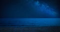 Amazing starry sky over sea at night Royalty Free Stock Photo