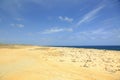 Amazing stone desert landscape, blue sea and blue sky Royalty Free Stock Photo