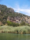 Amazing stone tombs in the rock on the river bank