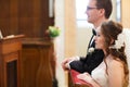 Amazing stylish cute groom and bride on the background old goth