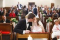 Amazing stylish cute groom and bride is kissing on the backgrou Royalty Free Stock Photo