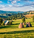 Amazing summer scene of Cluj County, Romania, Europe. Sunny morning view of Rogojel village. Beauty of countryside concept backgro