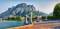 Amazing summer scene of Como lake. Wonderful morning cityscape of central park of Lecco town, Italy, Europe. Traveling concept bac