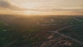 Amazing summer sunrise aerial view. Golden sun rising in morning cloudy sky Royalty Free Stock Photo