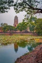 Amazing summer view of ruins of the ancient Buddhist temple Wat Phra Ram. Royalty Free Stock Photo