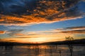 Amazing sunrise with blue sky and golden clouds