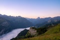 Amazing sunrise in the ossau valley. magnificent sea of clouds in the valley. pic du midi d`ossau in the background. portrait Royalty Free Stock Photo