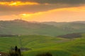 Amazing sunrise over the green hills of the Tuscany countryside,  Italy Royalty Free Stock Photo