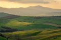 Amazing sunrise over the green hills of the Tuscany countryside,  Italy Royalty Free Stock Photo