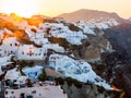 Amazing sunrise Santorini view with cave houses. Santorini island. Greece