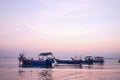 Amazing sunrise with silhouette image fishing boat view as a foreground.Nature composition:Ideal use for background Royalty Free Stock Photo