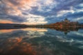 Amazing sunrise view over Danube river, beautiful reflections of morning clouds mirrored in water, Esztergom, Hungary Royalty Free Stock Photo