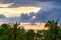 Amazing sunset at the beach with palm trees in Thailand Royalty Free Stock Photo