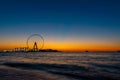 Amazing sunset colors over the sea view to the Ain Dubai, giant Ferris at Bluewaters Island  close to JBR beach. Royalty Free Stock Photo