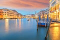 Amazing sunset and evening cityscape of Venice with famous Canal Grande and Rialto Bridge Royalty Free Stock Photo